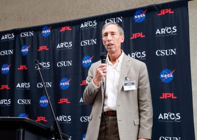 JPL Deputy Director Larry James giving a speech