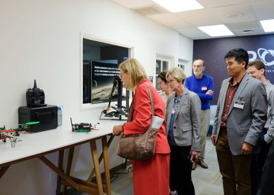 CSUN President Diane Harrison and Dr. Mary Beth Walker viewing the drones