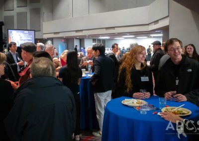 Attendees Gathered by Tables at ARCS STEAHM Nexus 2023 Event
