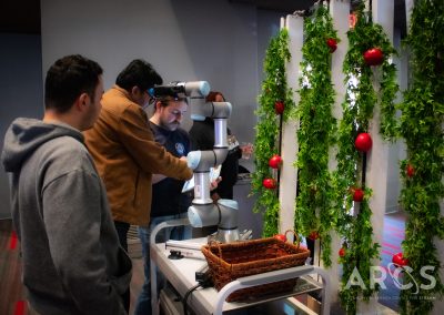 Image of People Standing by the Autonomous Growth System for Space Farming