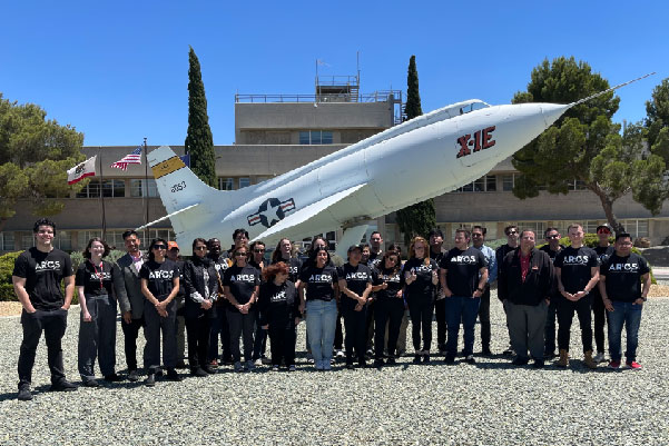 Image of ARCS team in front of aircraft